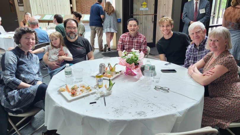 Table of people smiling 