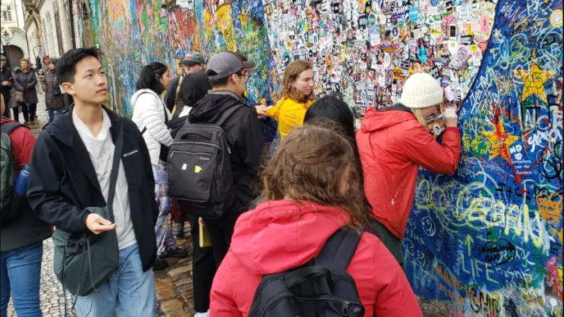 Students add to graffiti wall
