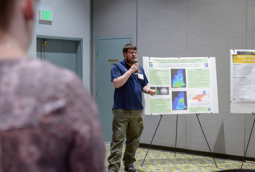 Lucas Price presents poster at 2023 TickBase Annual Meeting